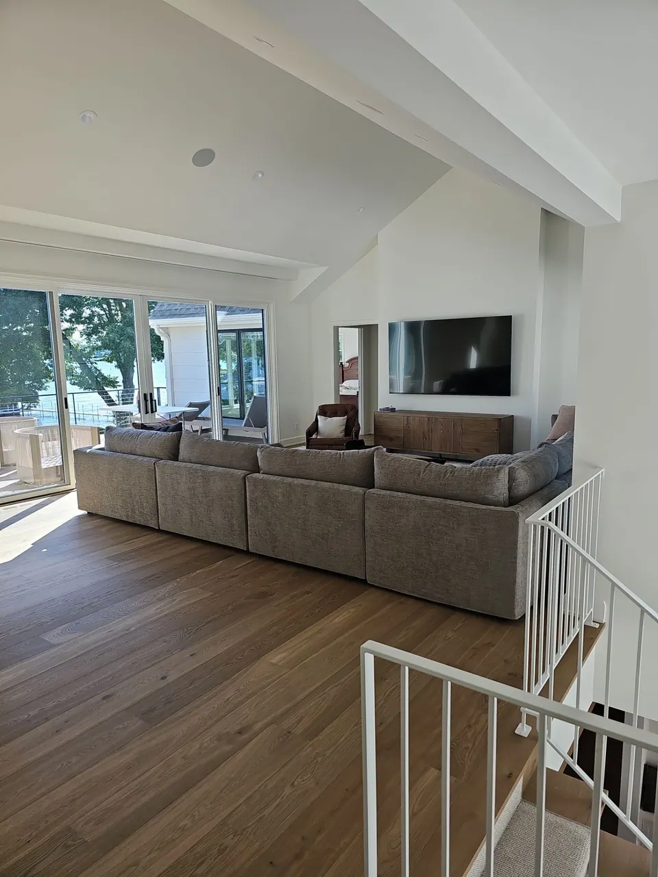 Living room fireplace with white painted built-in shelving on both sides