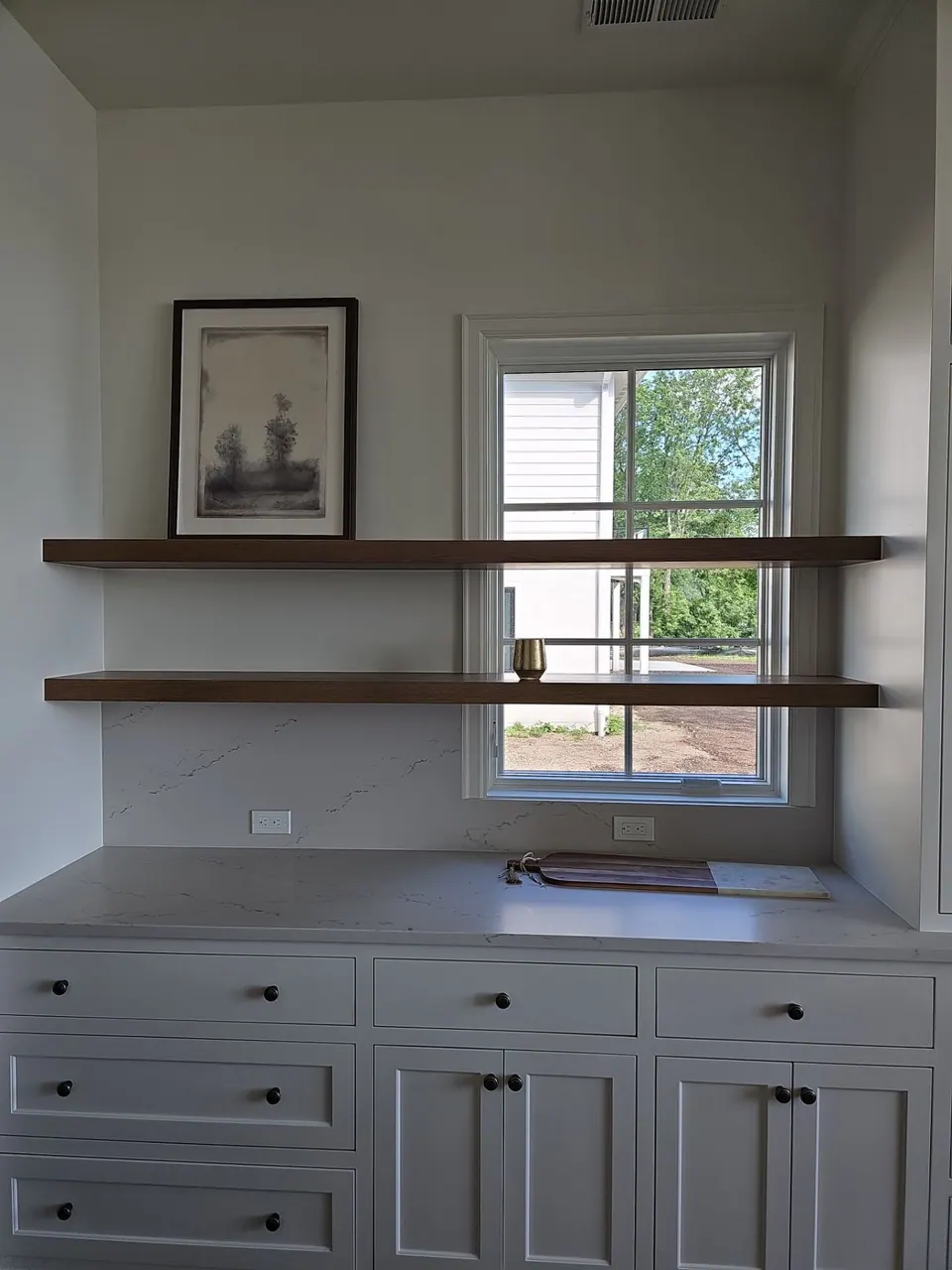 White painted built-in shelving